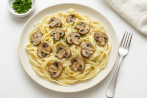 Tagliatelle met champignons en knoflookroom